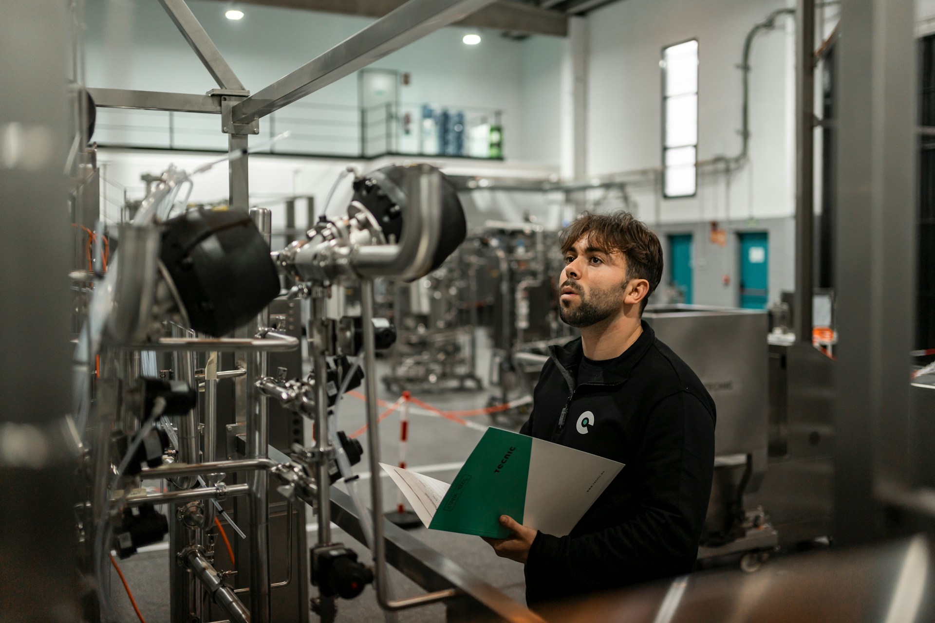 Supervisor reviewing documentation during a facility walk-through