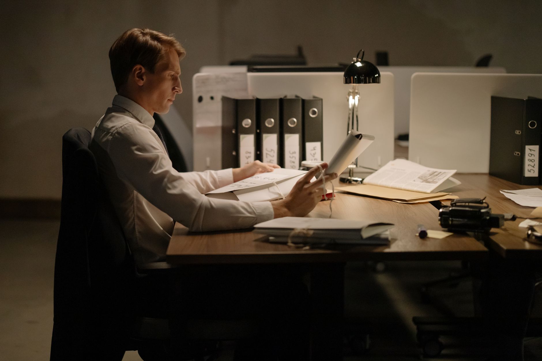 Engineer reviewing production part approval documents