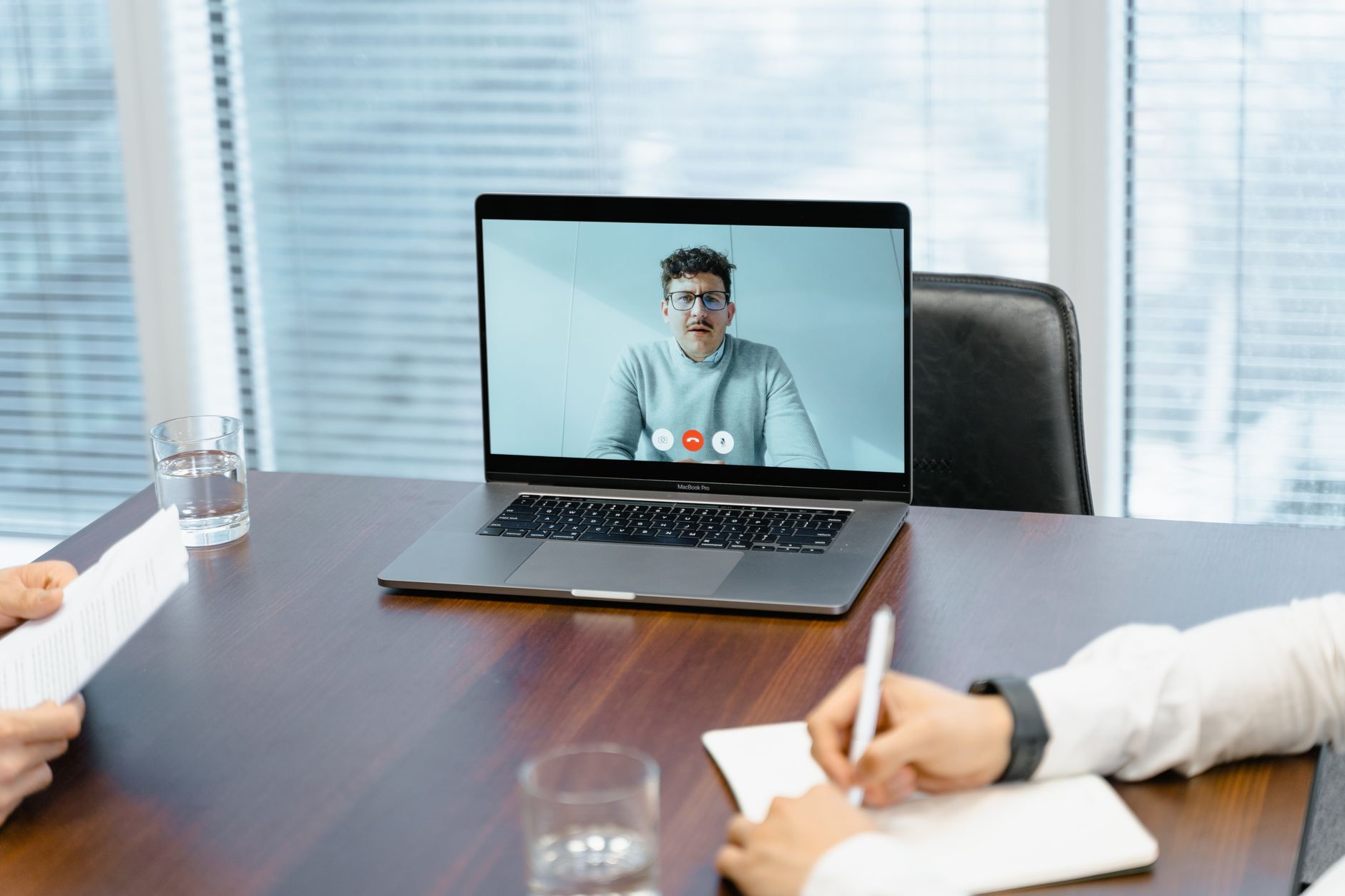 Engineer providing remote assistance through an AR-enabled video call