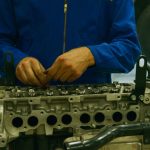 Technician inspecting an industrial bearing