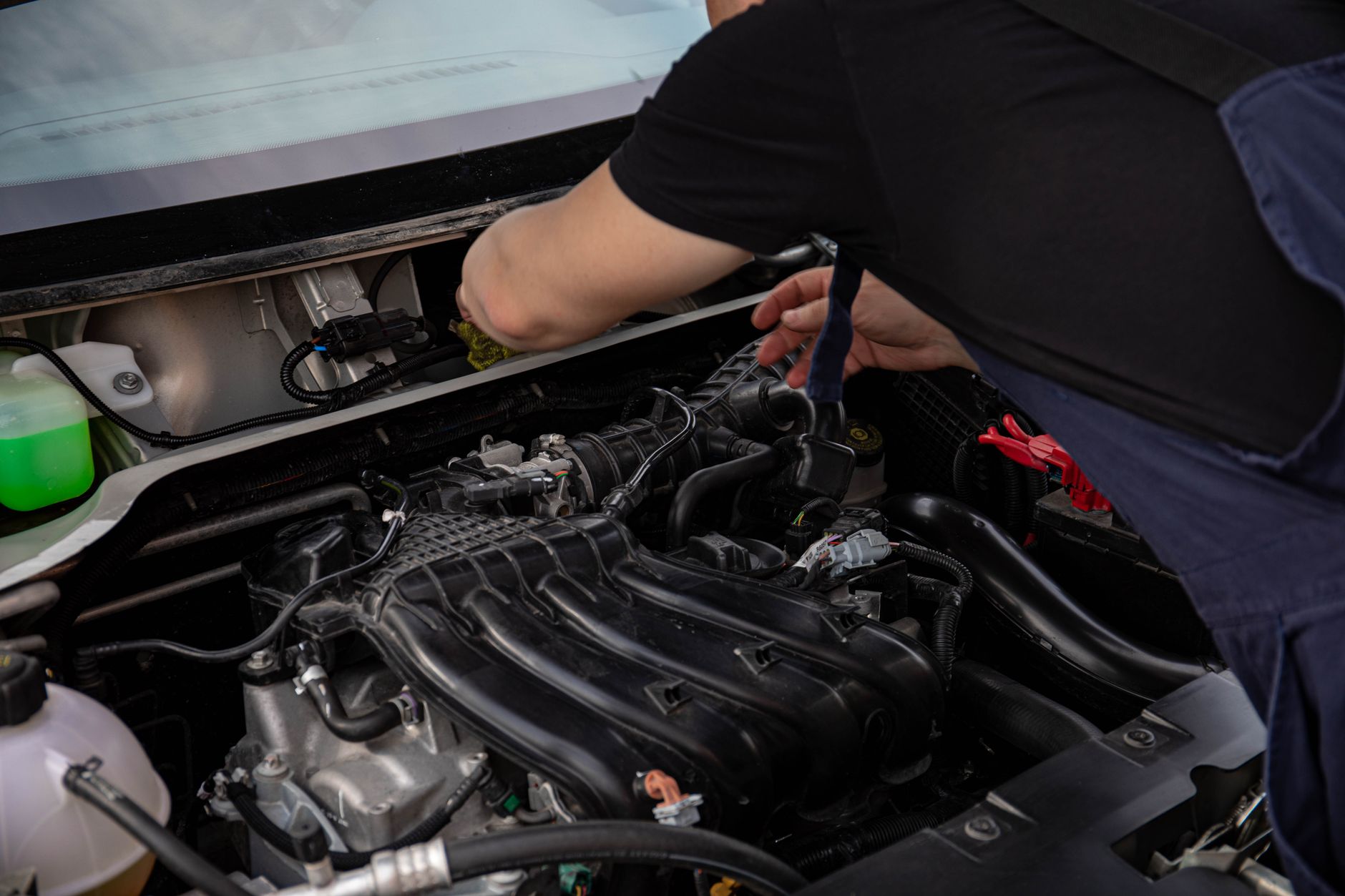 Technician applying lubricant to a bearing