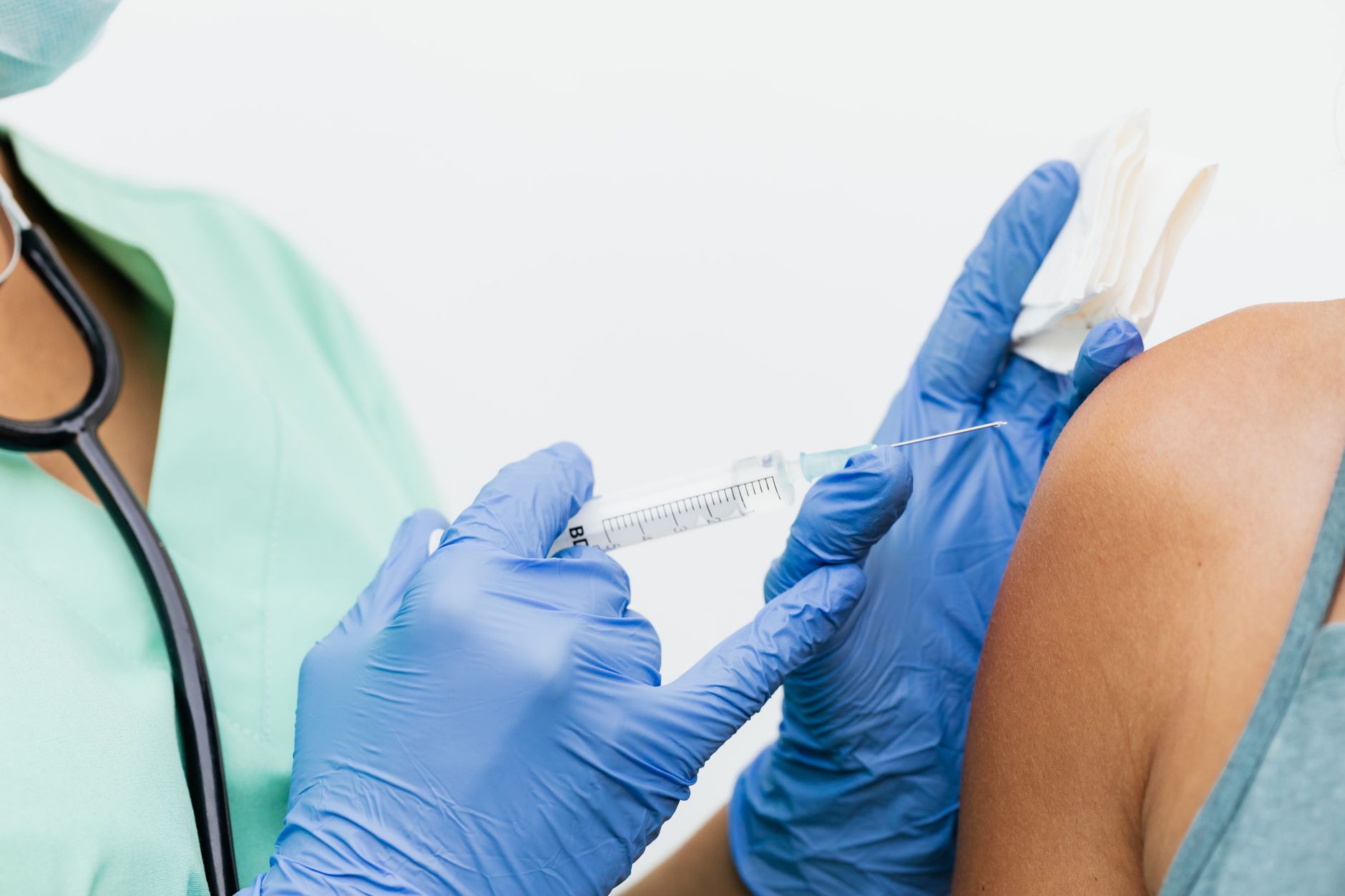 Occupational health nurse administering a vaccination