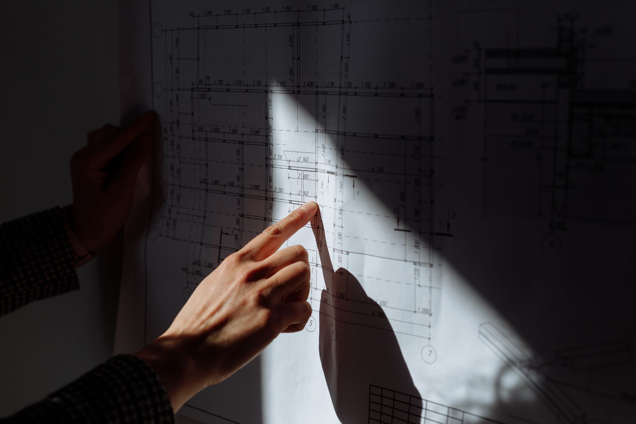 Team reviewing an engineering drawing together