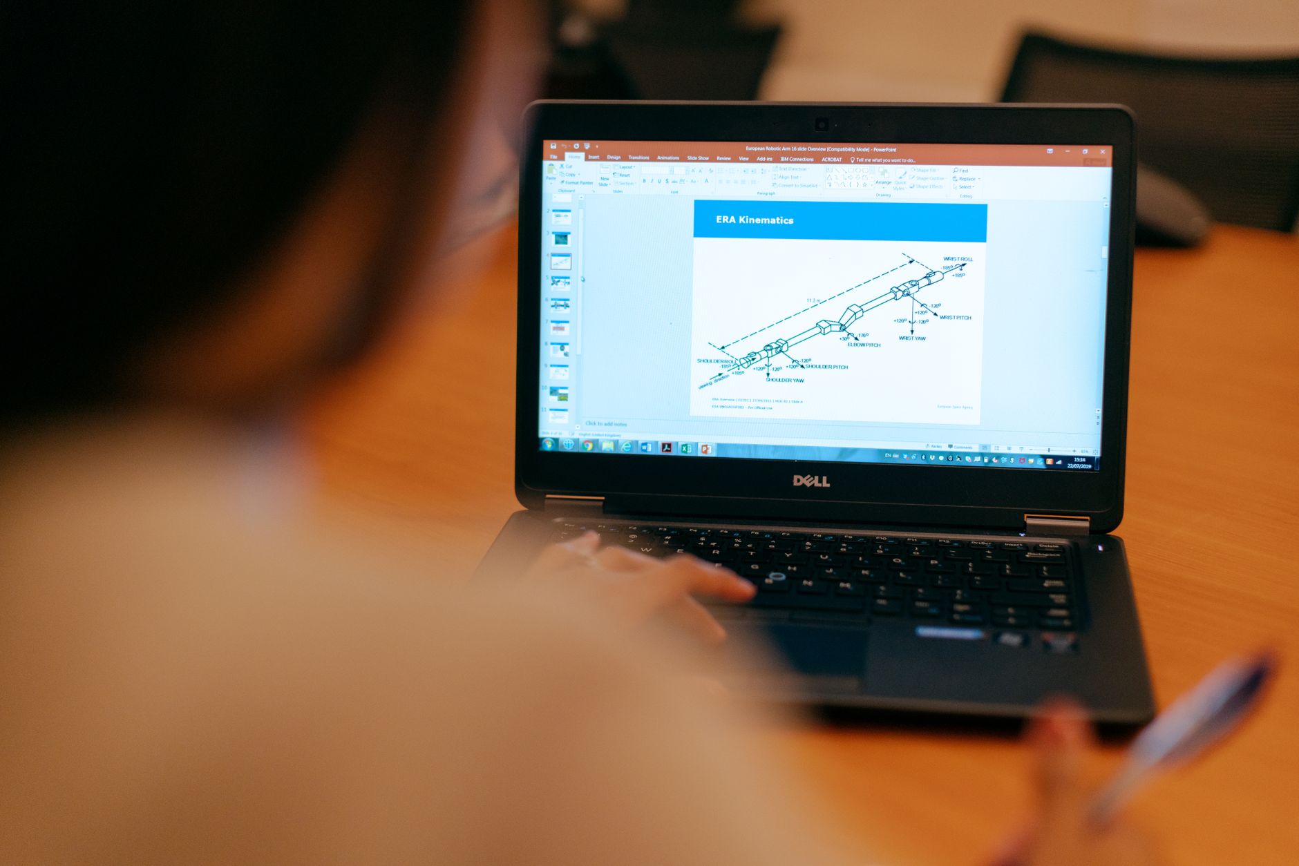 Reliability engineer analyzing failure trend data from CMMS records
