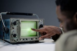 Quality engineer analyzing process data on a screen