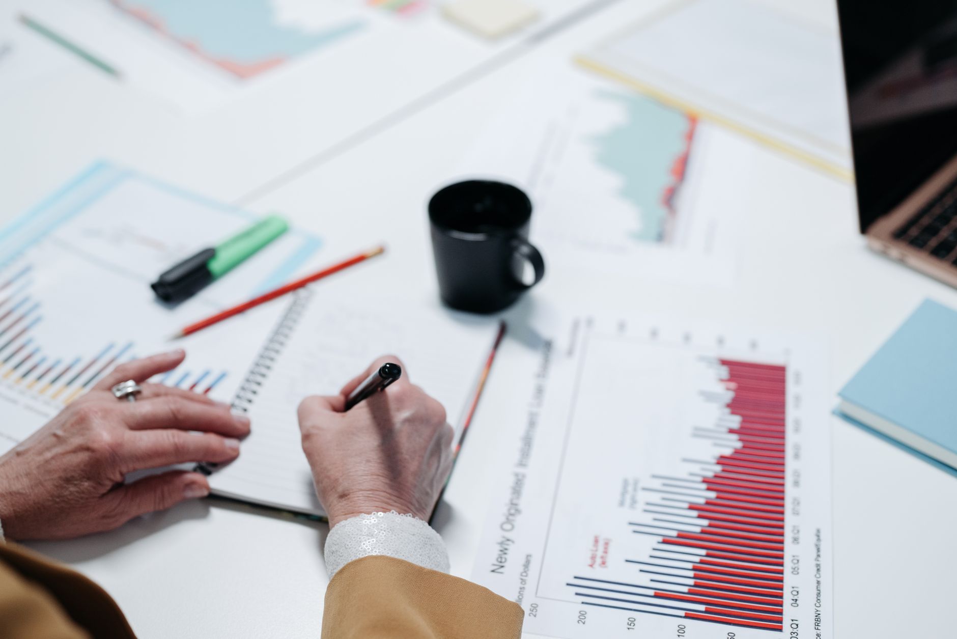 Technician plotting a process distribution histogram
