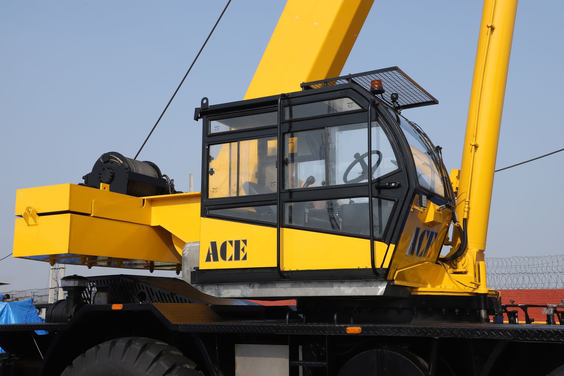 Crane operator in the control cab of an overhead crane