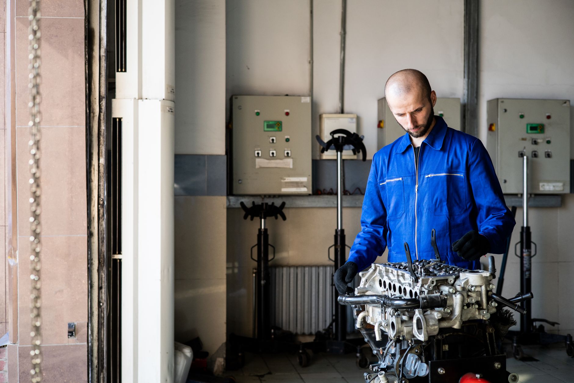 Maintenance technician inspecting industrial equipment
