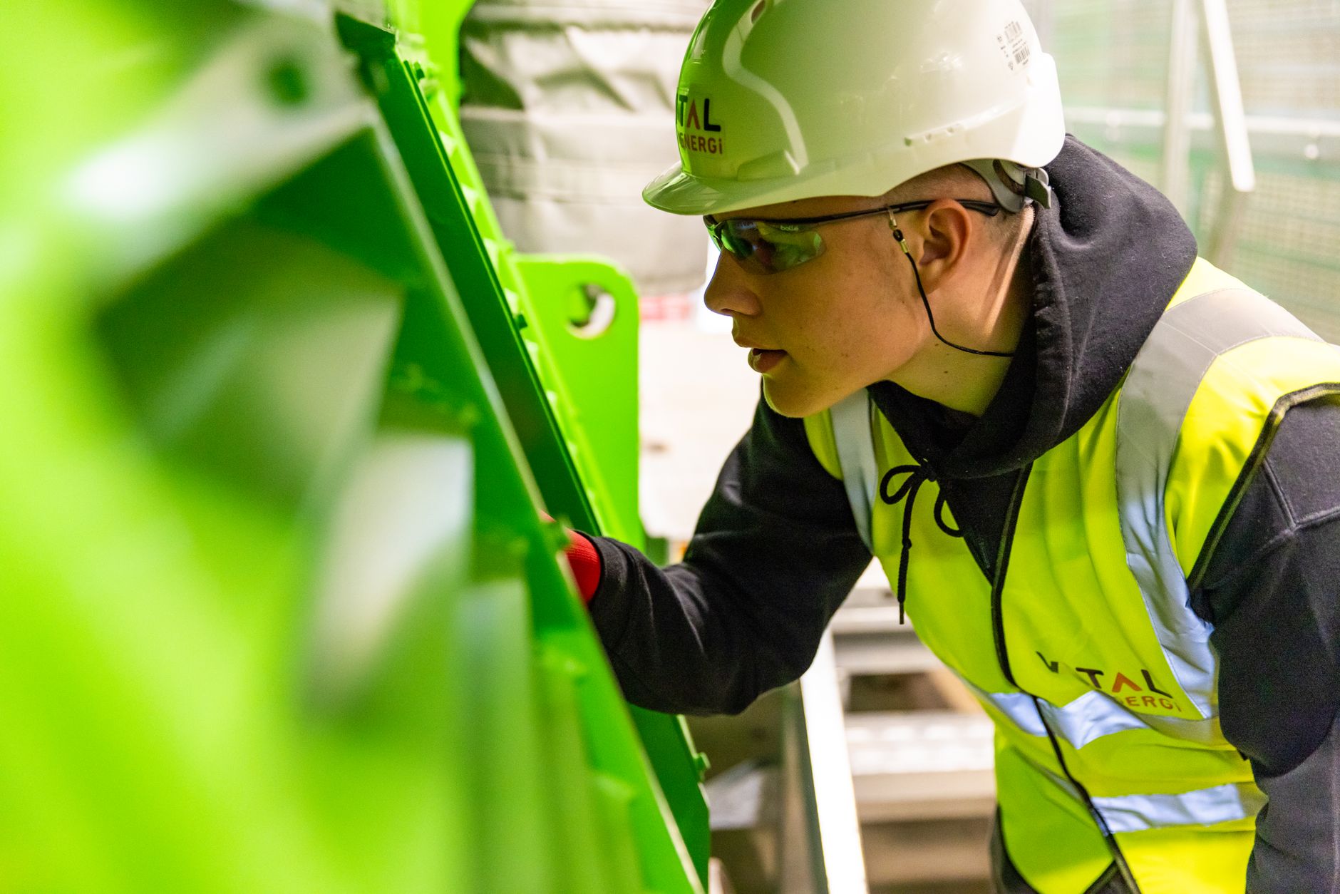 Technician collecting baseline data for a DMAIC project