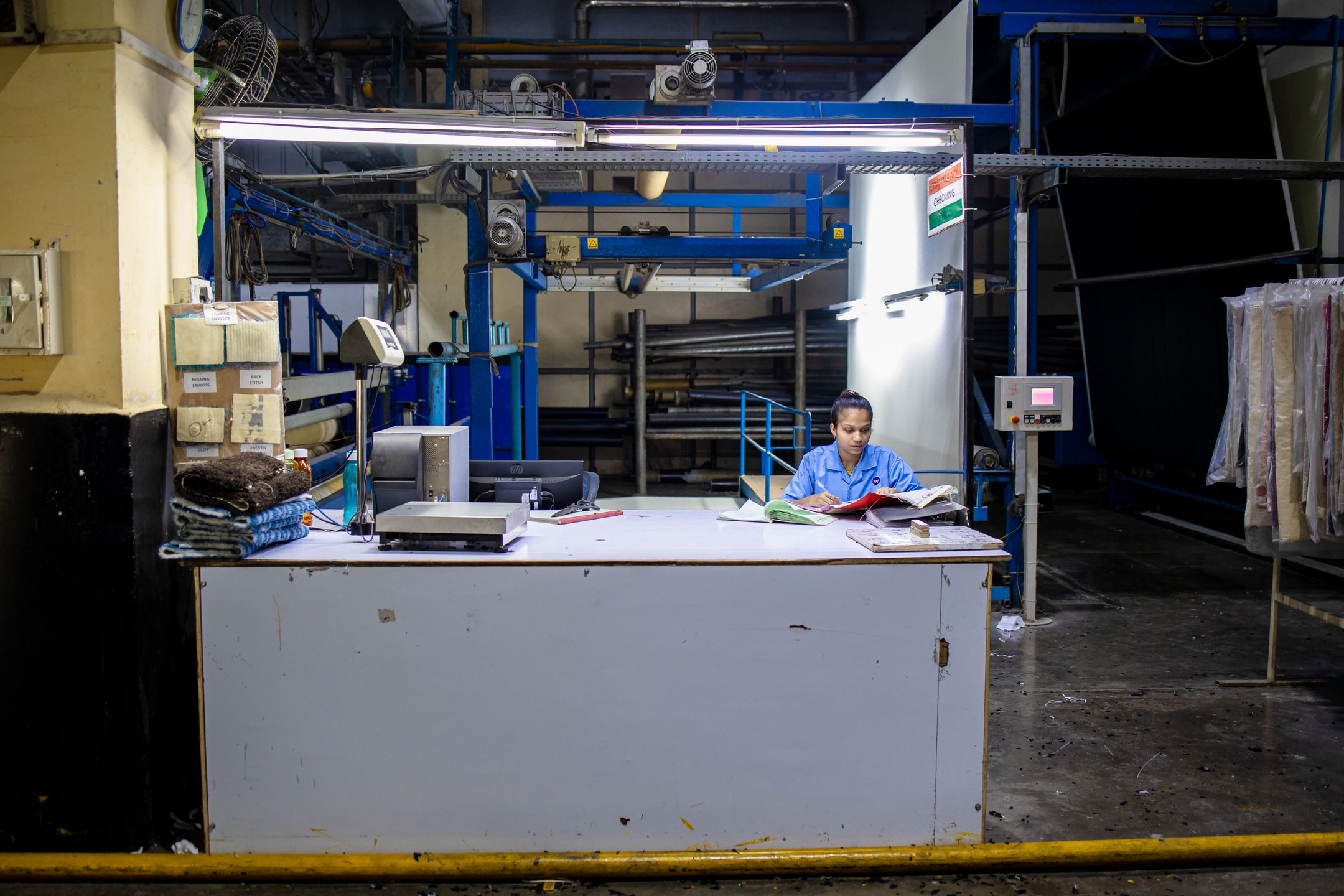 Technician inspecting industrial equipment