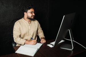 Production planner reviewing an ERP order schedule
