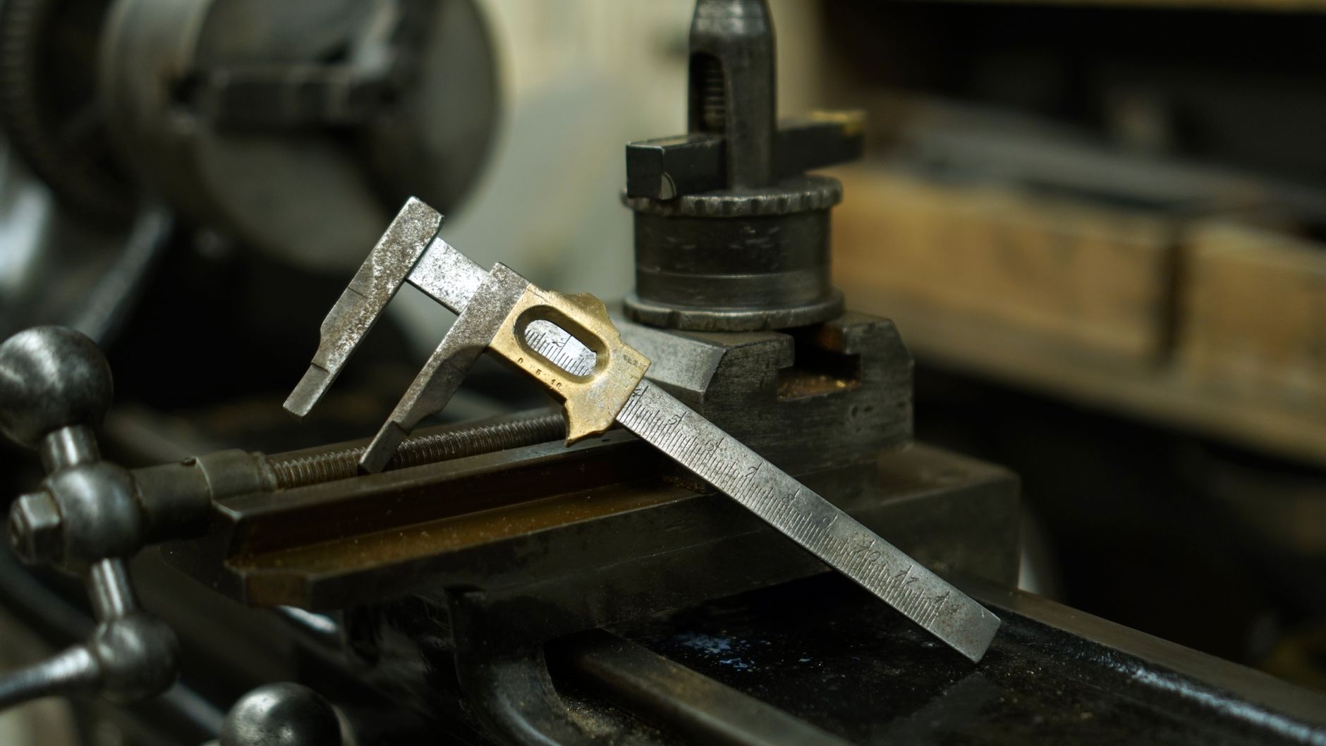 Precision caliper gauge used to check a machined part's tolerance