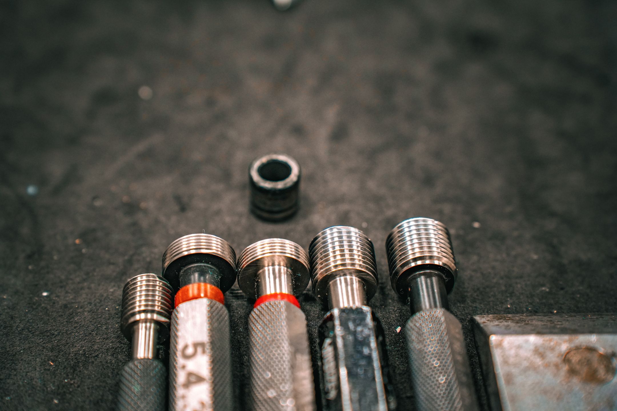 Precision locating pins in a fixture setup