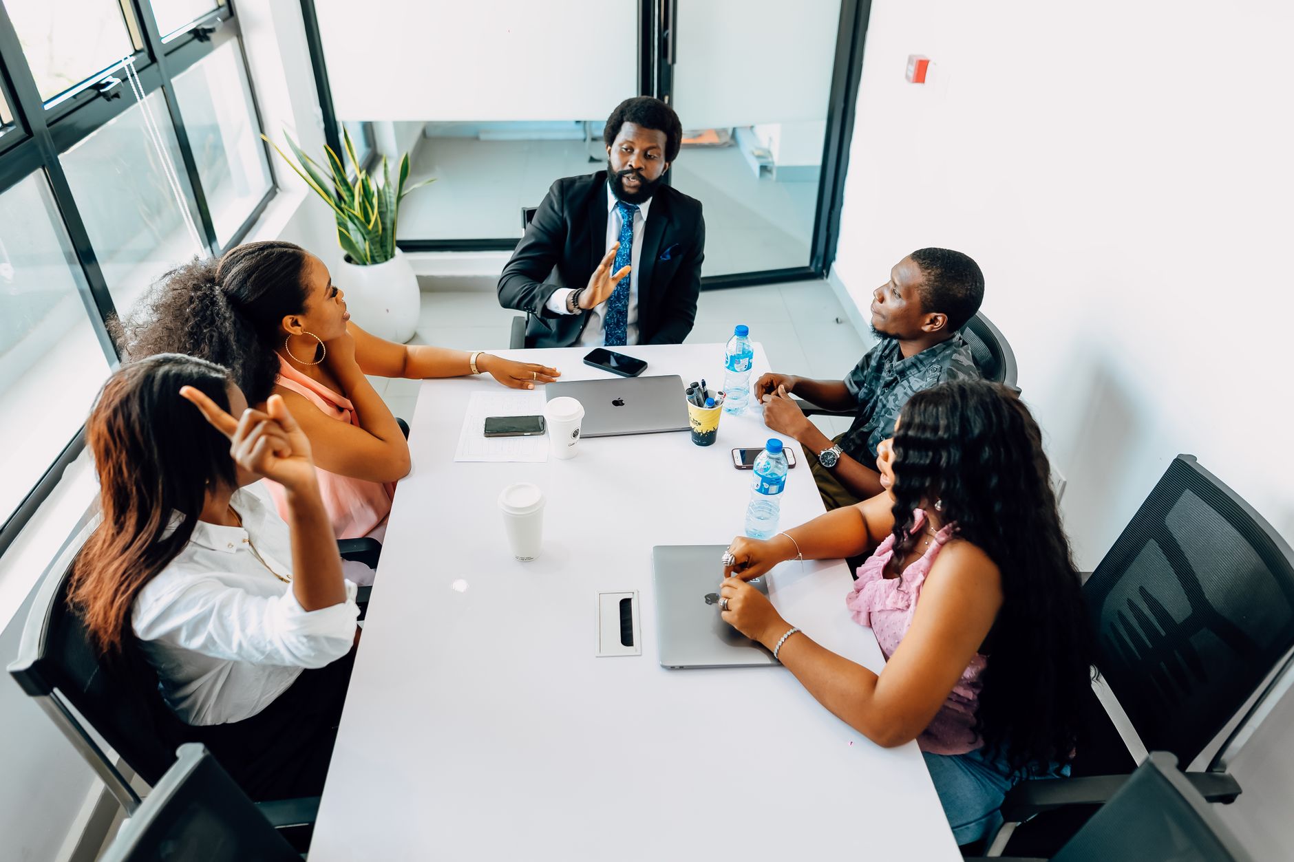 Cross-functional team meeting to discuss failure modes