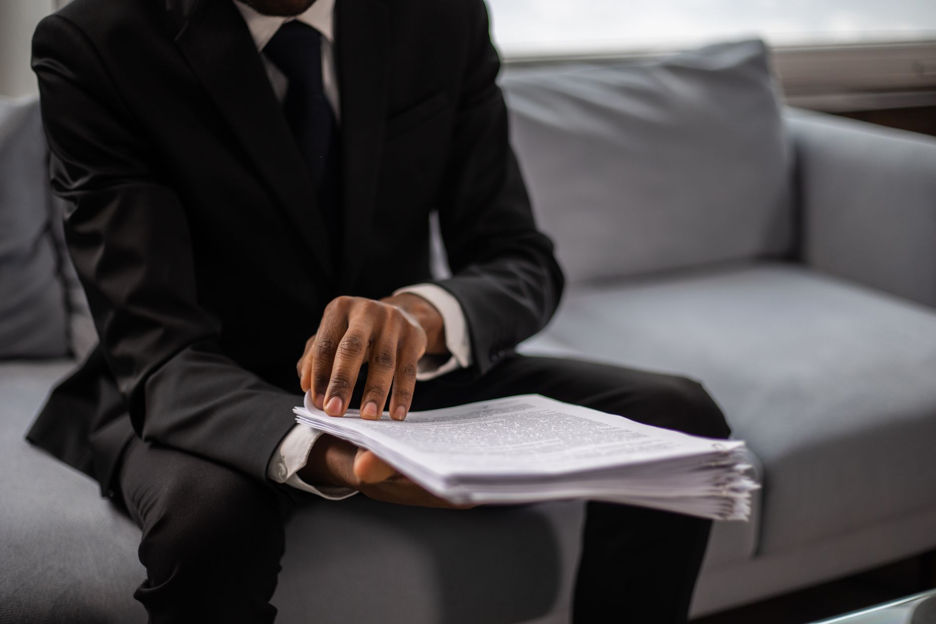 Quality manager reviewing an FMEA handbook document