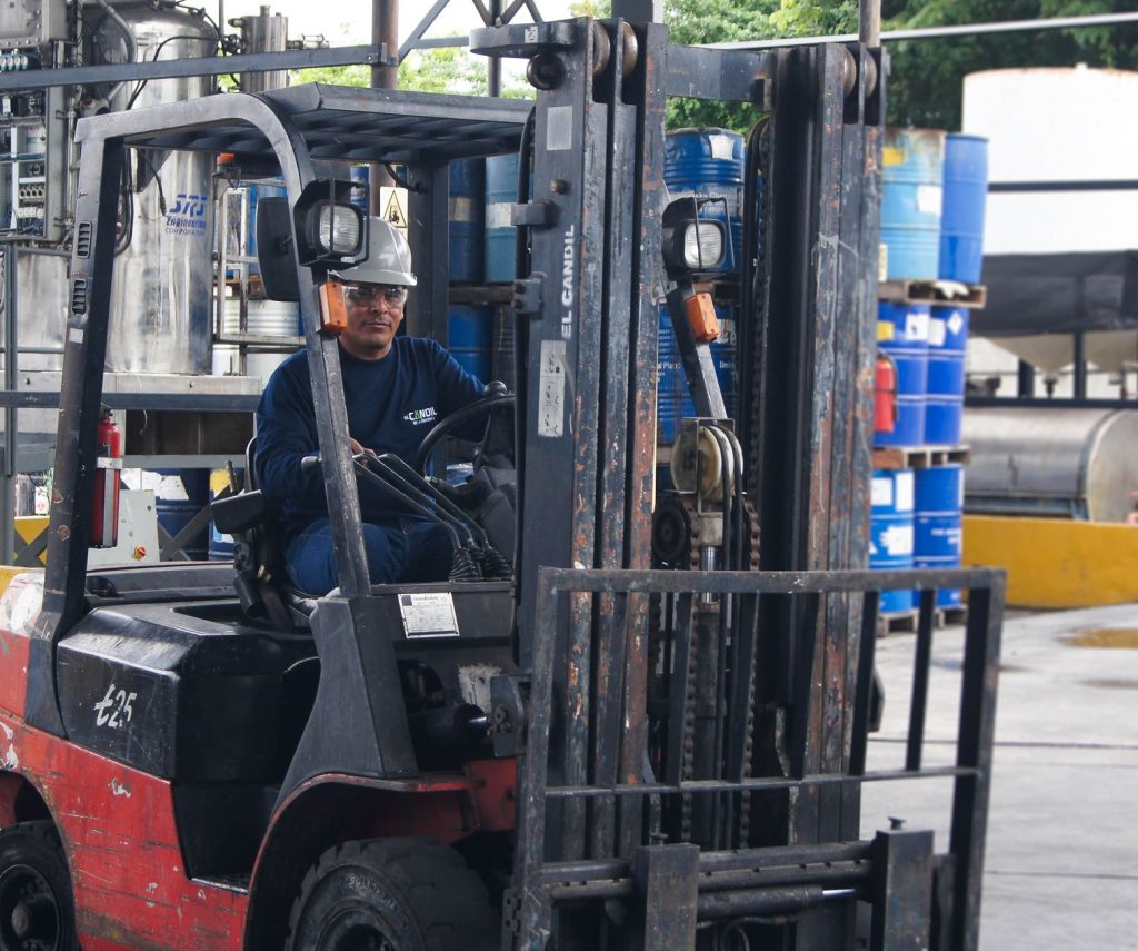 Forklift operator working in a warehouse