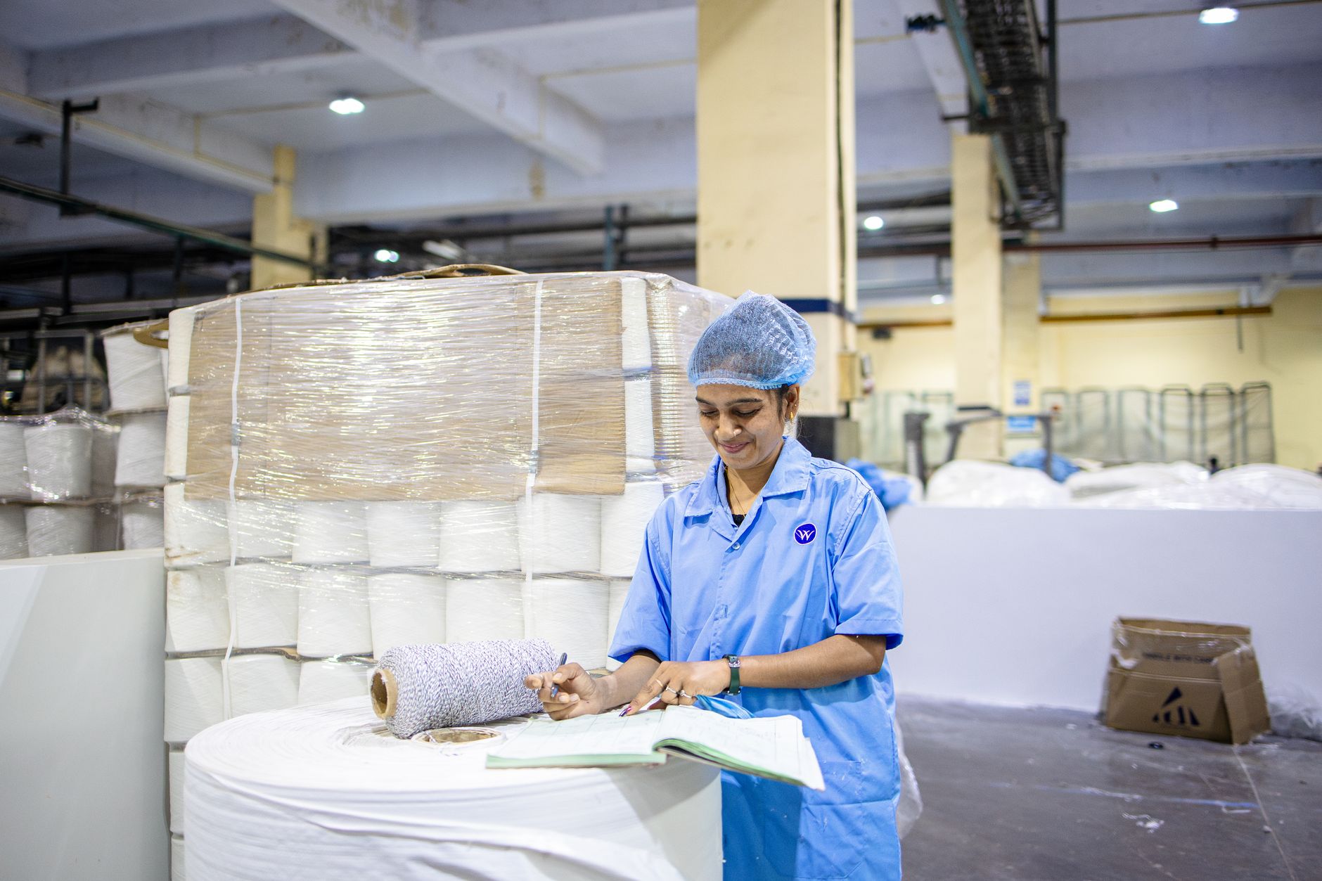 Manager observing a production line during a Gemba walk