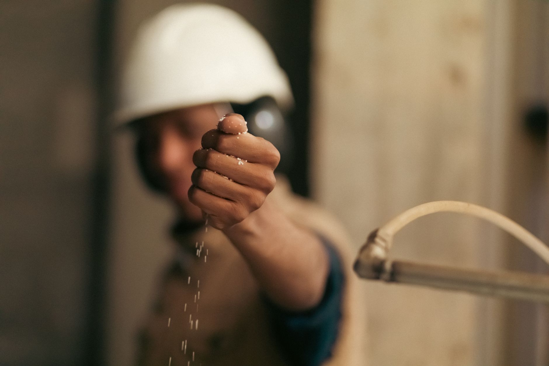 Technician taking a noise level measurement with a meter