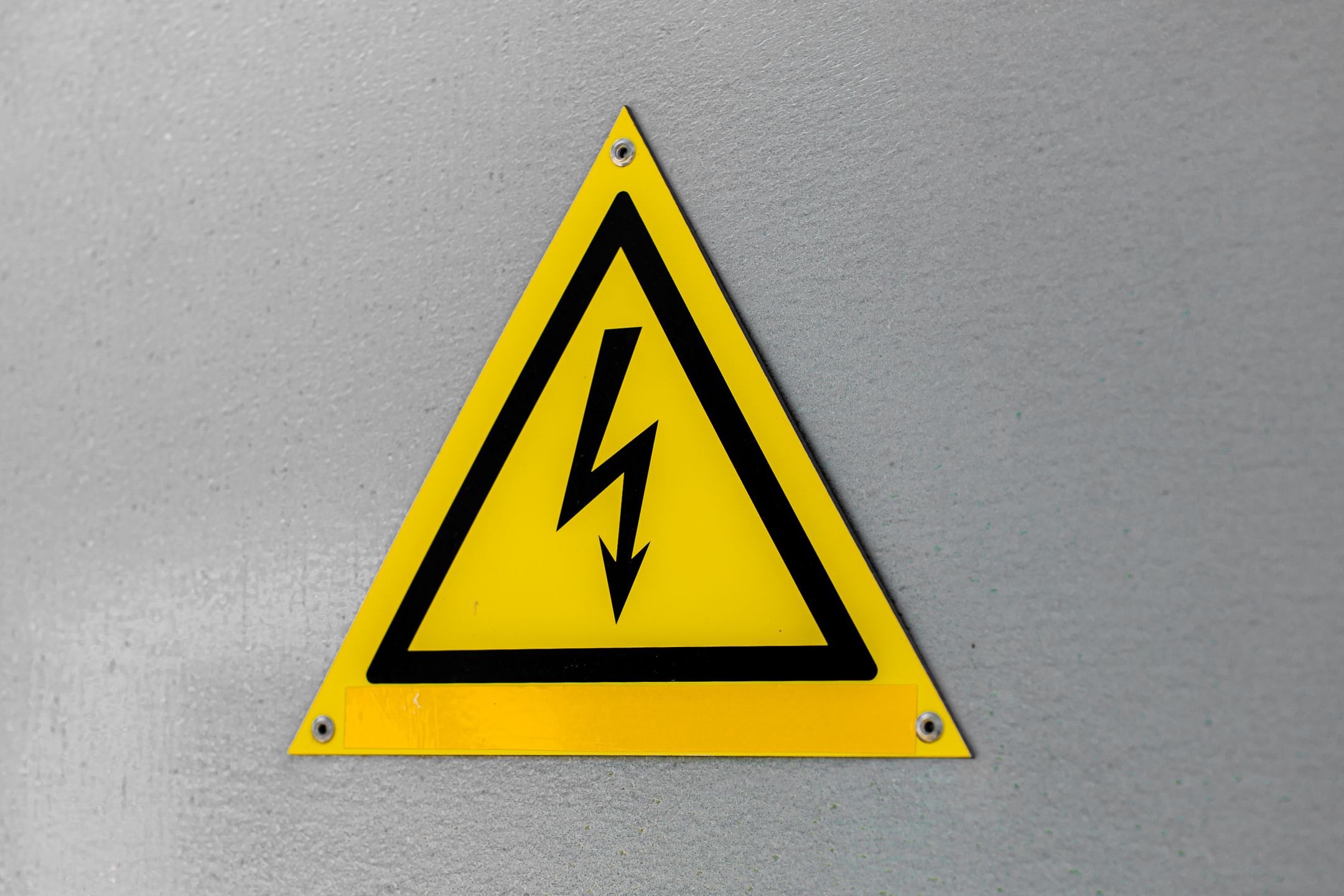 Electrical panel with high voltage warning signage