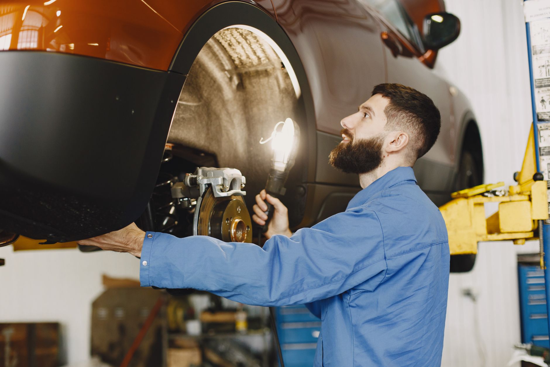 Quality engineer inspecting an automotive component