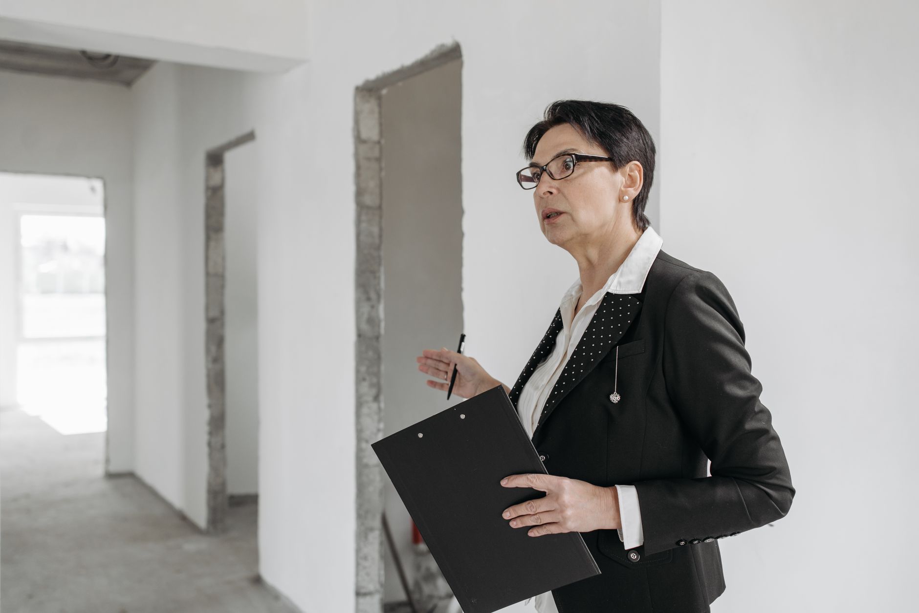 Auditor reviewing calibration records and traceability documentation