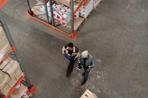 Safety manager walking through a manufacturing facility