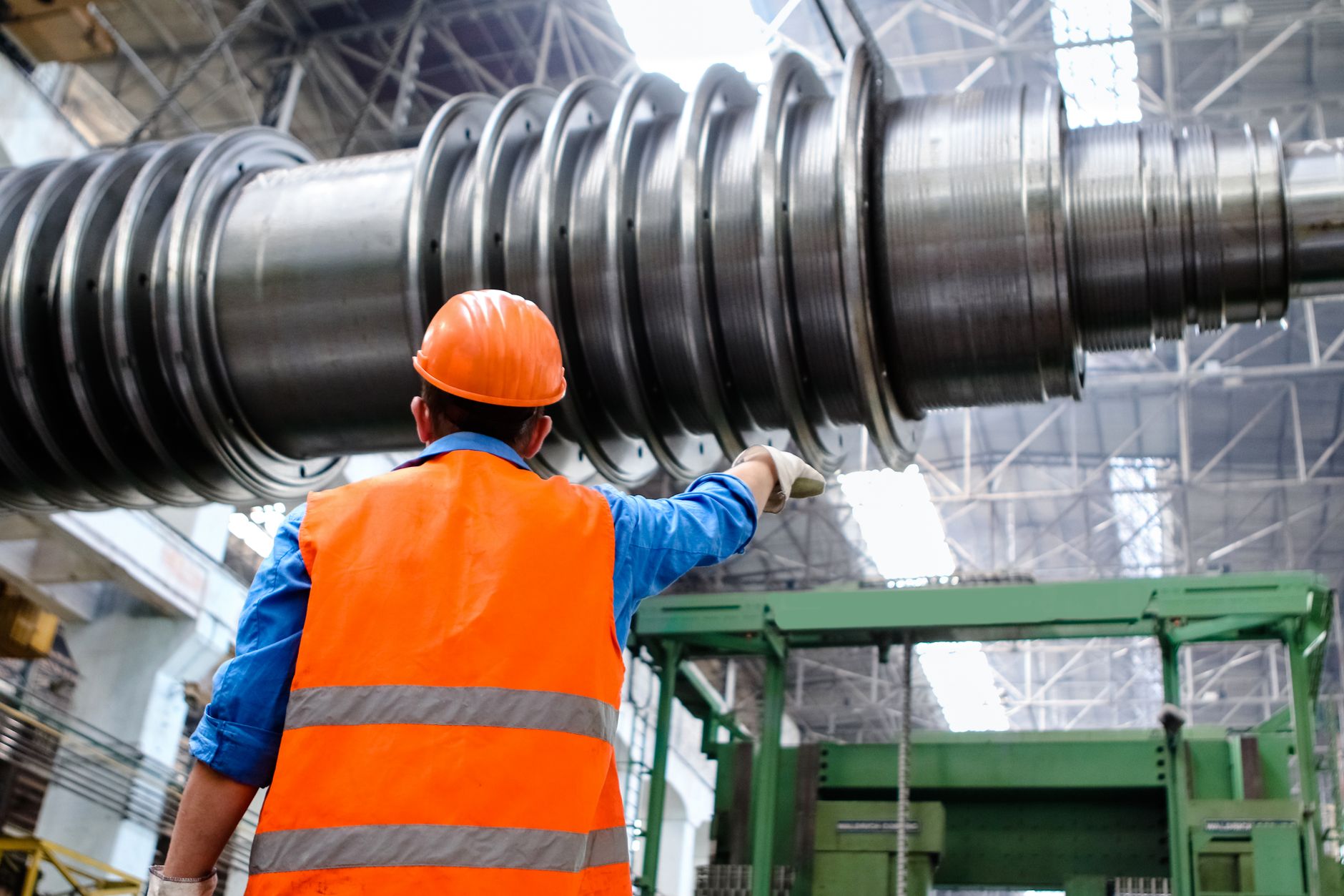 Engineer evaluating an engineering control for a manufacturing process