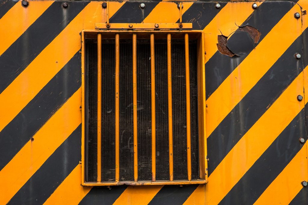 Safety light curtain installed on an industrial machine