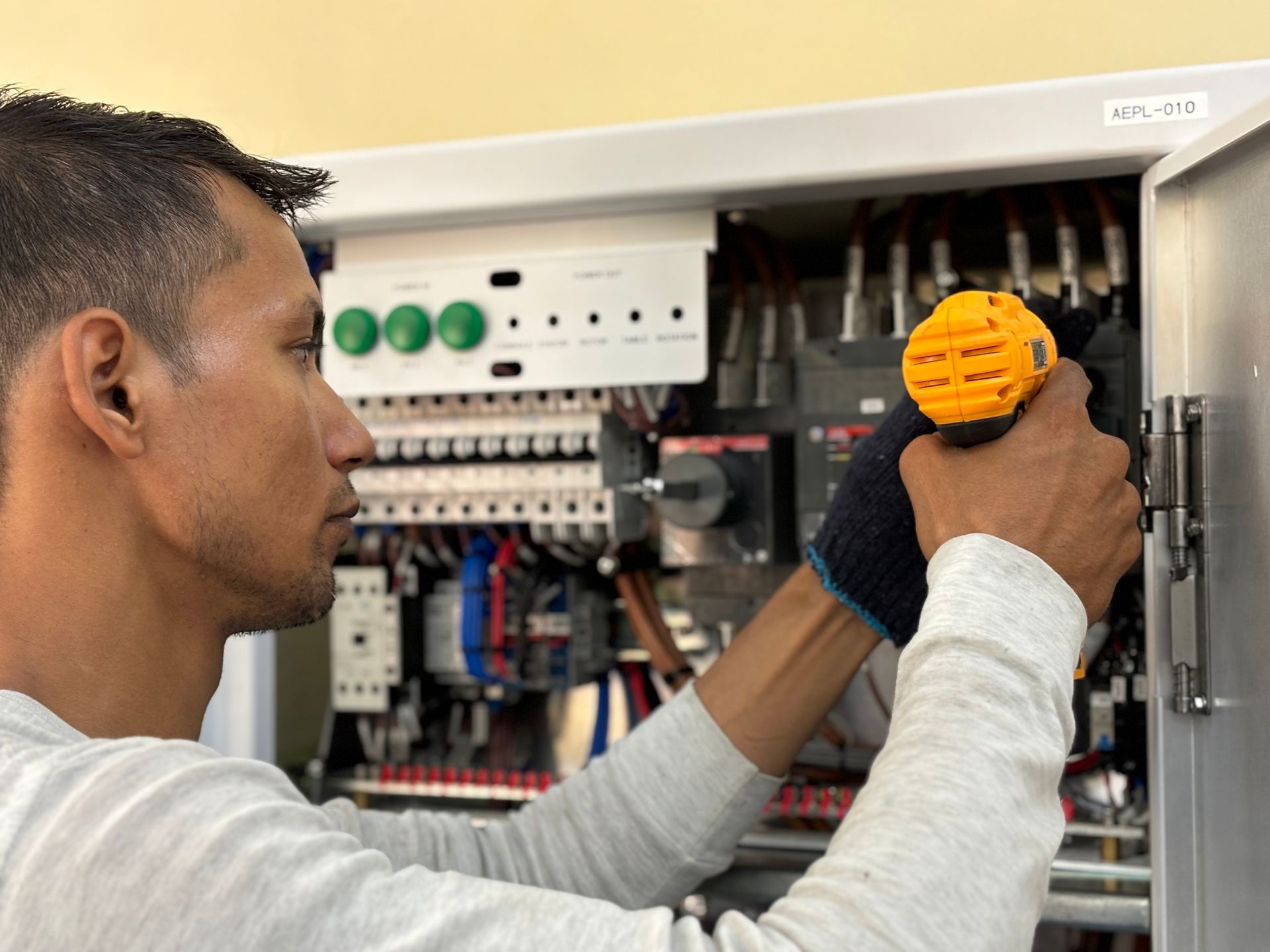 Technician verifying a zero energy state before maintenance