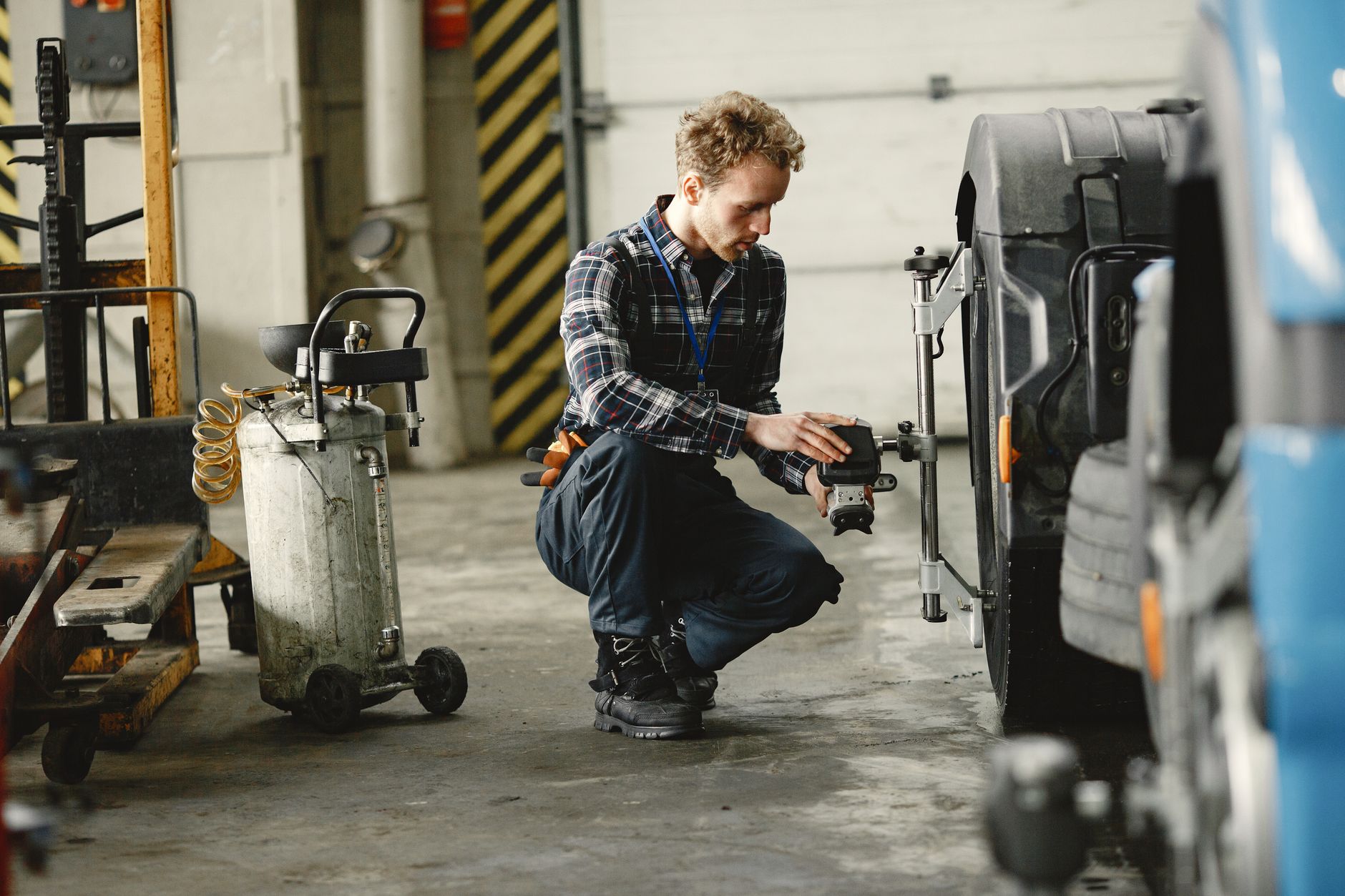 Technician calibrating a vision inspection camera system