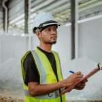 Maintenance planner preparing a work pack with parts list and job scope