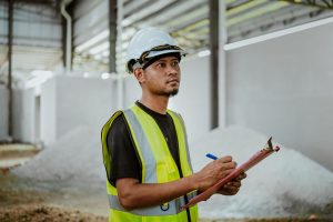 Maintenance planner preparing a work pack with parts list and job scope