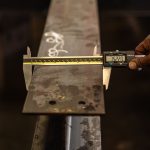 Quality technician conducting a gauge measurement study