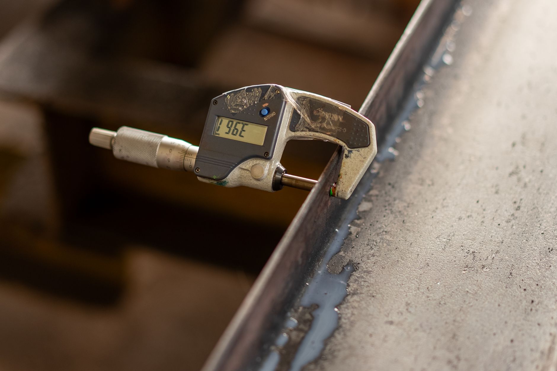 Operator measuring a part repeatedly for a gauge study