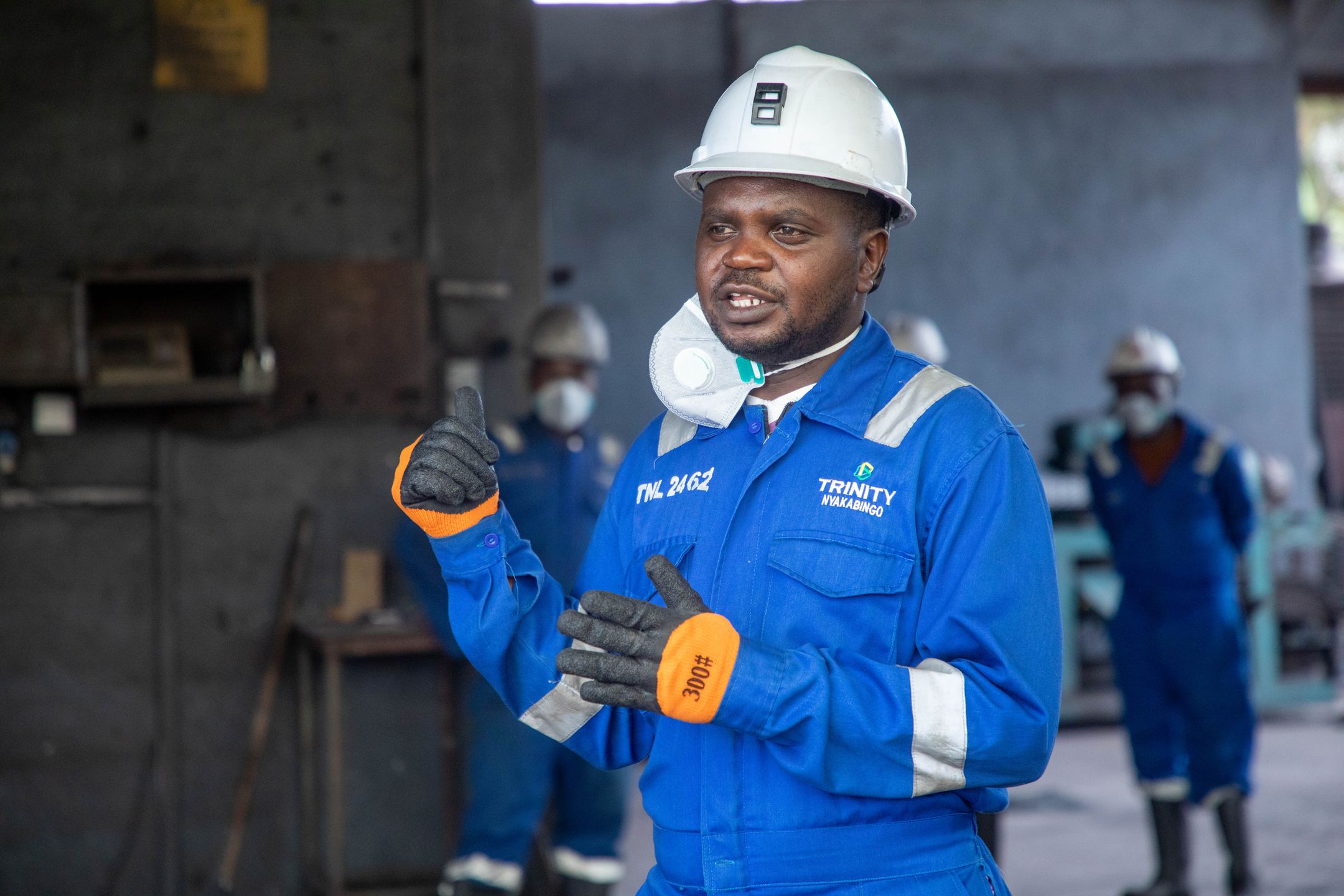 Engineer discussing safety procedures with workers