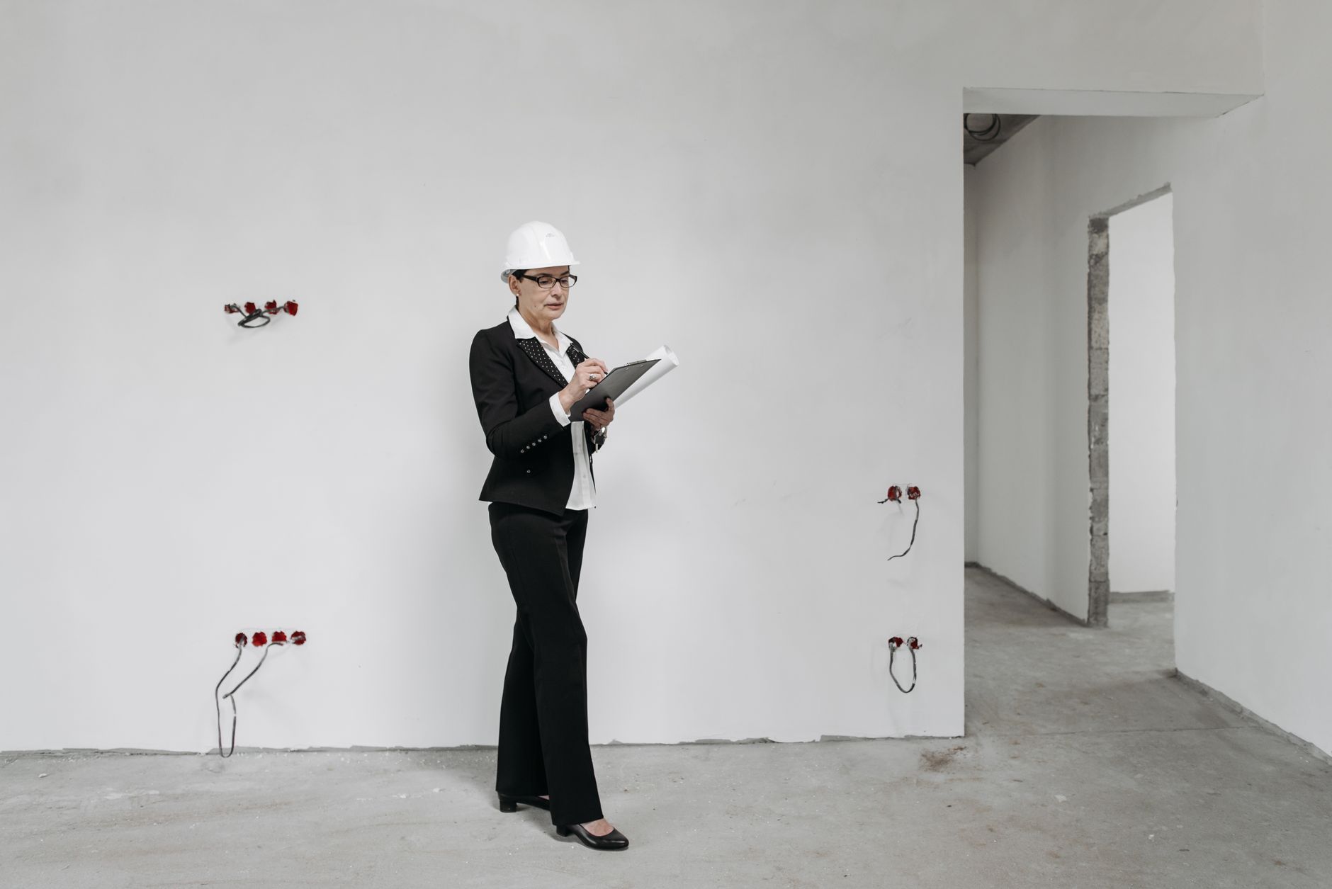 Engineer reviewing a control plan document at a workstation