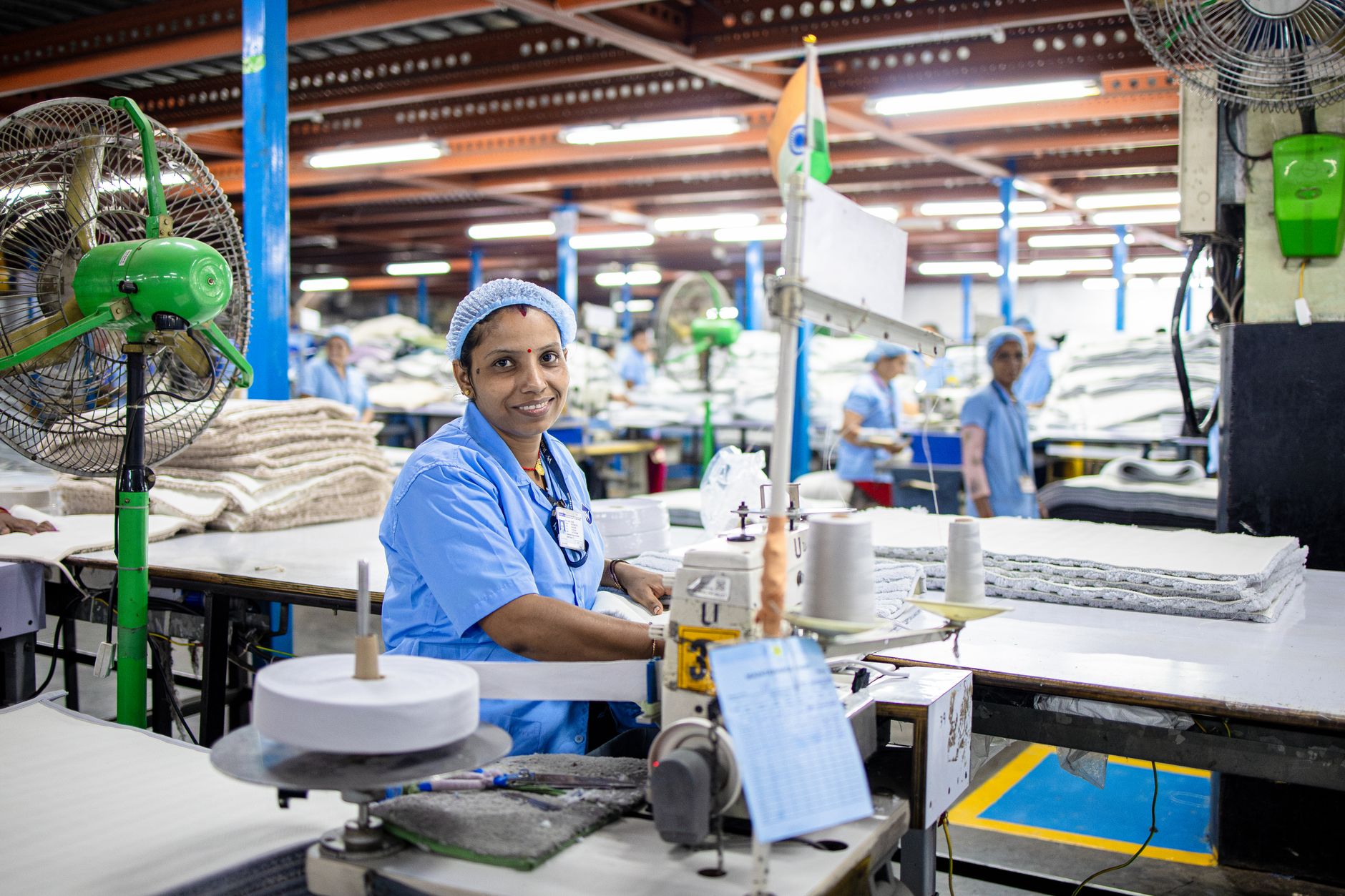 Workers starting up a new production line