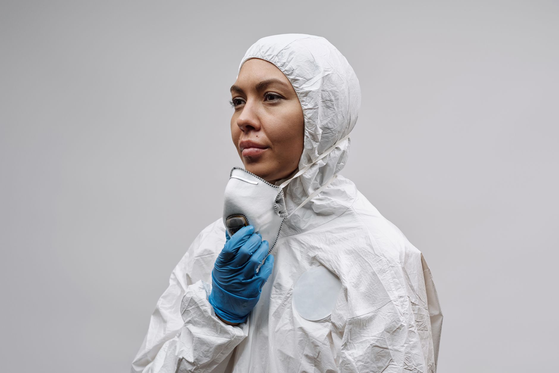 Worker properly storing a respirator in its case