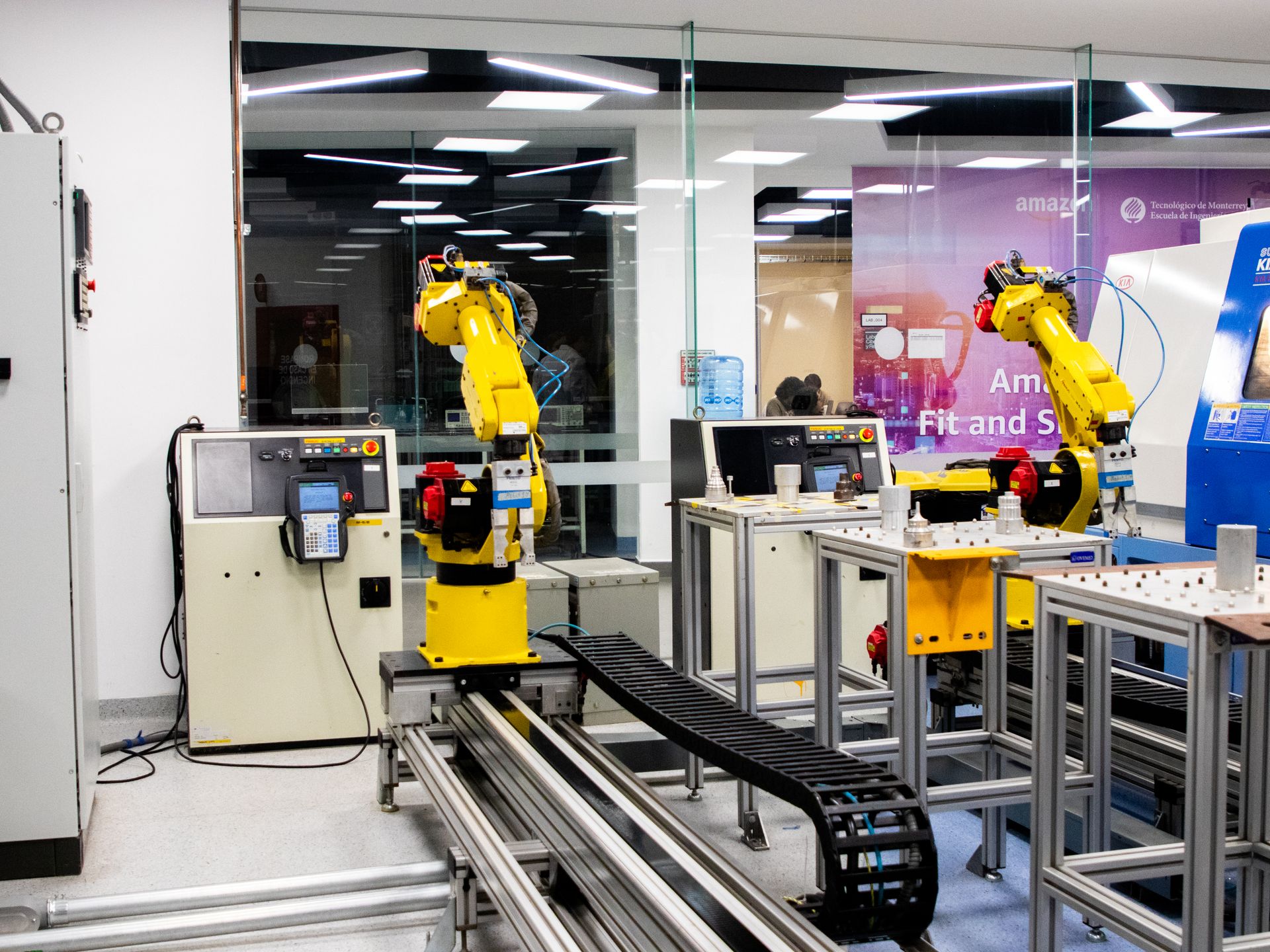 Industrial robots with teach pendant controllers in a training lab