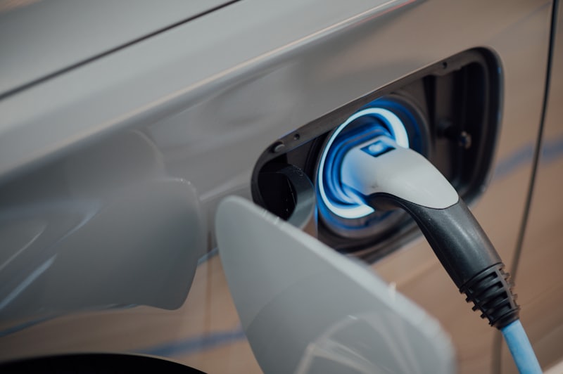 Charging cable plugged into the charging port of an electric vehicle