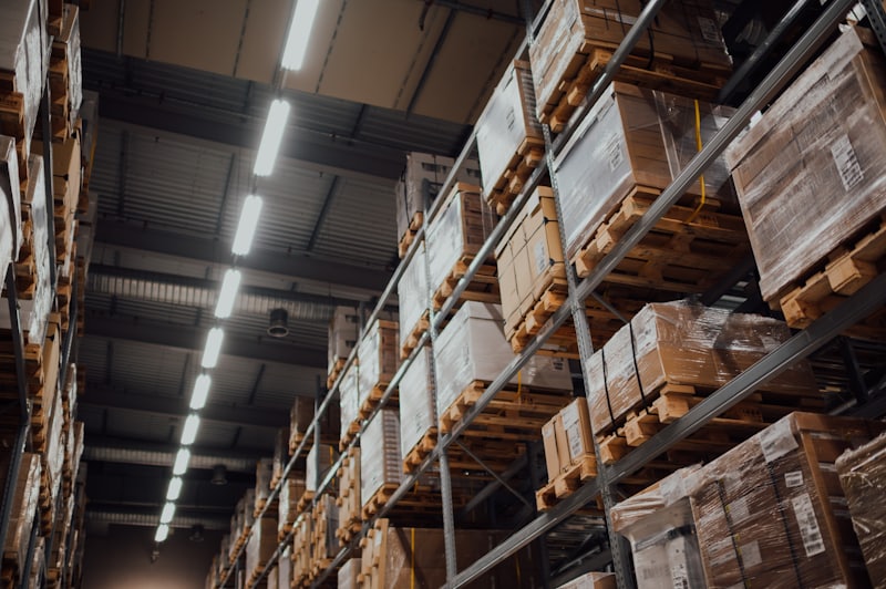 Pallets stacked on racking in a warehouse