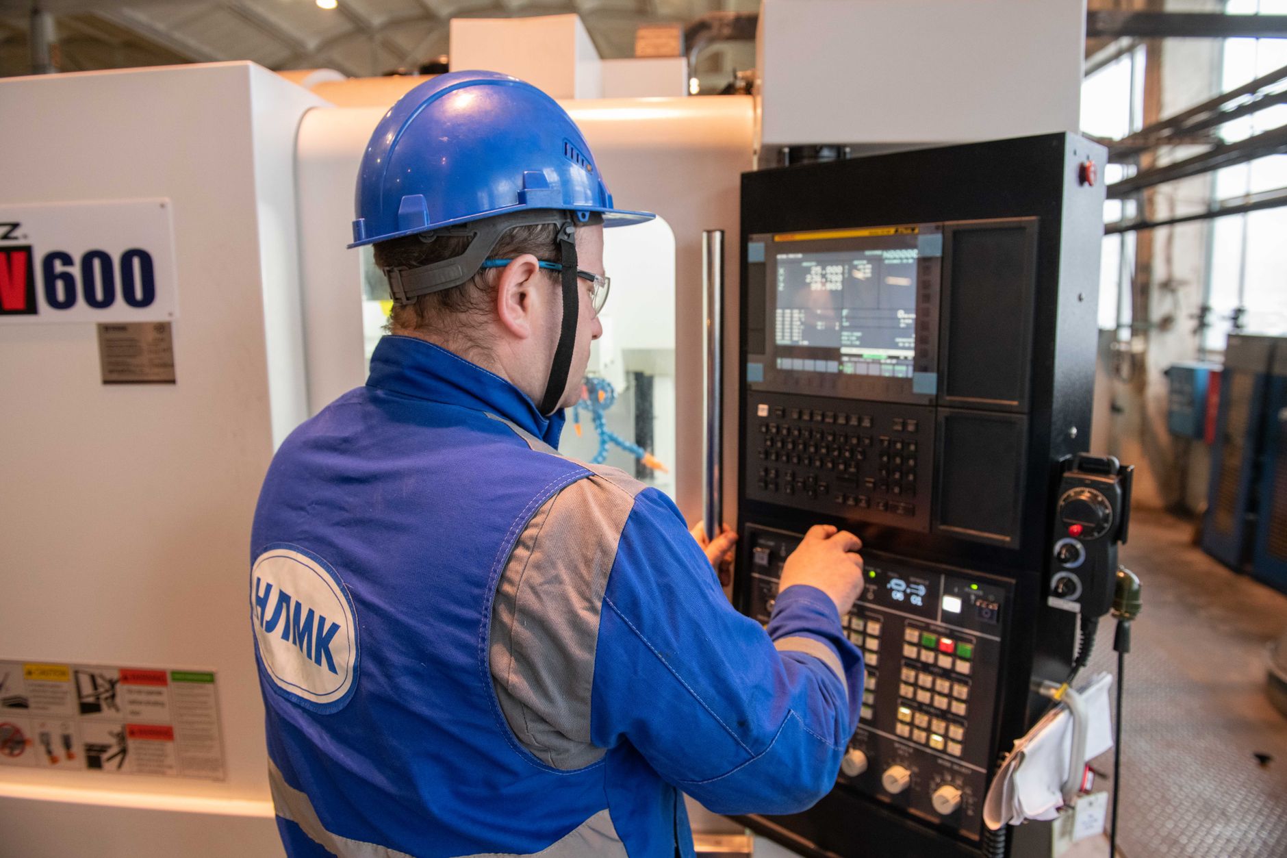 Technician measuring vibration on rotating equipment