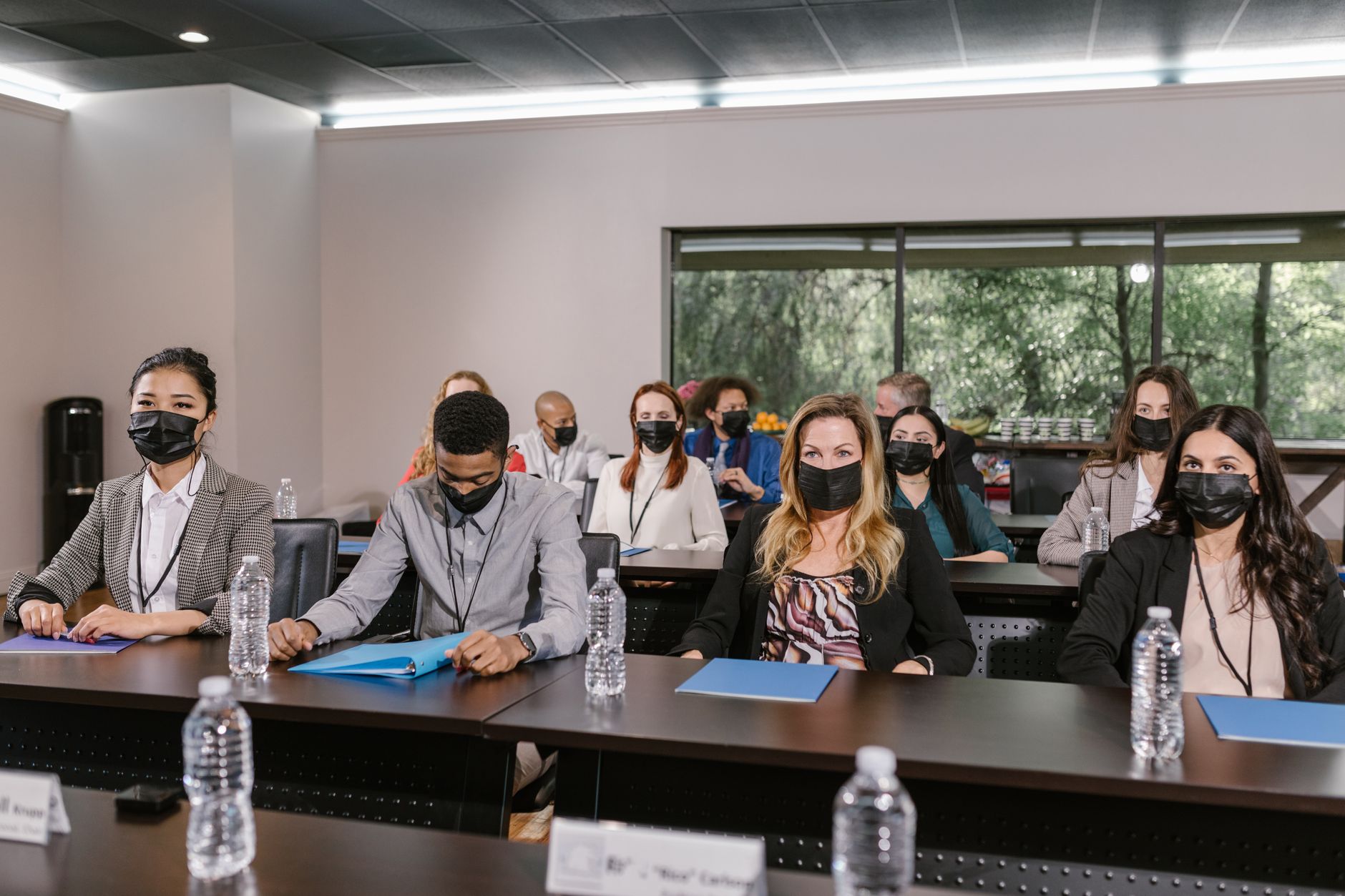 Black belt training session with employees around a table