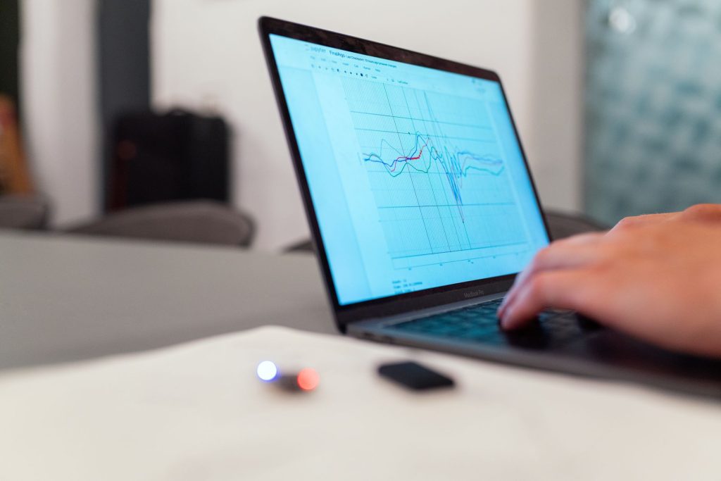 Quality engineer analyzing statistical data on a computer screen