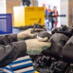Maintenance technician working on industrial equipment