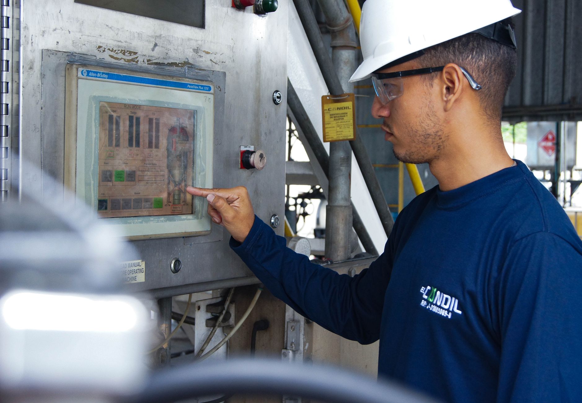 Operator monitoring a machine dashboard with process data