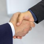 Business handshake representing a supply chain partnership