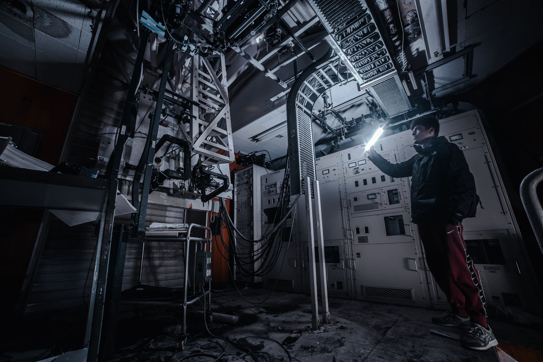 Technician adjusting infrared camera settings before a scan